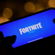 a person logging into Epic Games' Fortnite on their smartphone in Los Angeles on August 14, 2020